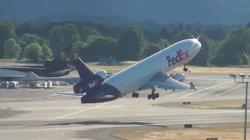 FedEx MD-11 cargo aircraft taking off